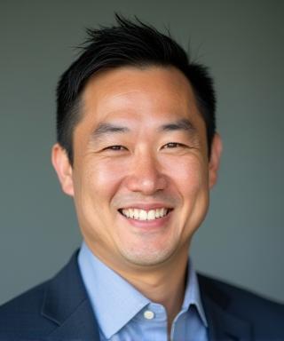 Professional headshot of David Chen